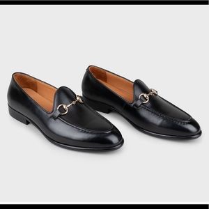 Black leather loafers by Joie. BRAND NEW